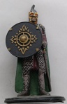Miniatura Soldado de Rohan no Abismo de Helm - Coleção Senhor dos Anéis (Eaglemoss)Figura ricamente detalhada apresentando o guerreiro com seu escudo característico, armadura completa e capa verde.