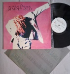 LP SIMPLY RED - A NEW FLAME C/ ENCARTE // CAPA CONFORME FOTOS // DISCO EM MUITO BOM ESTADO // PODE CONTER RISCOS QUE CAUSAM CHIADOS, RUÍDOS OU PULOS