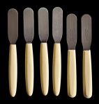 TRAMONTINA - Lote composto por 6 espatulas em inox com cabo em plástico -14 cm - com riscos do uso.