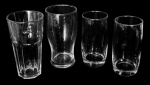 Lote composto por 4 copos em vidro - 16x08 cm os maiores e 14x07 cm os menores.
