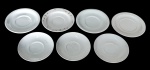 Lote composto por 7 pires para chá em porcelana - 14 diam os maiores e 13 diam os menores - com riscos do uso.