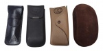 Lote composto por 4 cases de óculos - sendo 1 Ray Ban em couro 06x16x03 cm - 1 Lacoste em tecido 15x06x03 cm - 1 Zélio em couro sintético 15x05 cm - e 1 Rodd&Gunn em veludo 05x17x08 cm.