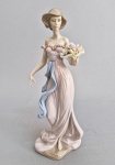 LLADRO 6365 SPRING FLIRTATION GIRL WITH BASKET OF FLOWERS FIGURINE. Med. 32 cm ----- https://www.thecollectionshop.com/Fine-Art-By/Lladro/Spring-flirtation/6365./2