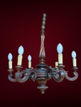 Lustre em madeira para 6 luzes - Lustre de grandes proporções em madeira maciça torneada e entalhada, com desenho clássico de inspiração barroca/neobarroca, composto por seis braços curvos simetricamente distribuídos a partir de corpo central robusto. Eixo vertical torneado em gomos, finalizado em pinha superior; base inferior com disco entalhado, mantendo unidade formal do conjunto. Peça desmontável podendo seguir pelos Correios. Dimensões: 110 cm de altura x 85 cm de diâmetro.Estado: estrutura em madeira em bom estado, necessitando lustração; parte elétrica a refazer; velas (suportes das lâmpadas) com desgaste, requerendo restauração estética.Observações: acompanha acabamento de teto (canopla); não possui corrente alongadora.Peça de forte presença visual, indicada para ambientes amplos e de pé-direito generoso, adequada tanto a interiores clássicos quanto a projetos contemporâneos de contraste após restauração.