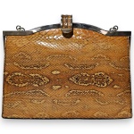 BOLSA CLUTCH, MADE IN ARGENTINA, CONFECCIONADA EM COURO COM DECORAÇÃO ANIMAL PRINT, ALÇA CONFECCIONADA EM METAL, MEDINDO 16 X 23 CM. NECESSITA FIXAÇÃO NA FECHADURA. TRATA-SE DE PEÇA SEMINOVA, PODENDO APRESENTAR SINAIS DE USO, MARCAS DO TEMPO, DESGASTES NATURAIS, PEQUENAS IMPERFEIÇÕES, RESTAUROS, REPAROS E/OU OUTRAS CARACTERÍSTICAS PRÓPRIAS DE SUA NATUREZA, USO E ESTADO DE CONSERVAÇÃO, NÃO SENDO TAIS ASPECTOS, POR SI SÓ, MOTIVO PARA DESCLASSIFICAÇÃO, CANCELAMENTO OU QUESTIONAMENTOS POSTERIORES, DEVENDO O ARREMATANTE CONSIDERAR TAIS CONDIÇÕES PREVIAMENTE À OFERTA E ARREMATAÇÃO.