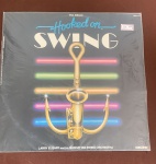 DISCO DE VINIL ,HOOKWD ON SWING,CONSERVADO ,NAO NOS RESPONSBIZAMOS POR PEQUENO RISCO