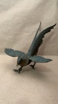 ESCULTURA DE BRONZE QUE  REPRESENTA UM FAISAO EM MOVIMENTO , CONSERVADA