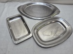 Lote de 2 bandejas e 1 travessa retangular em aço inox. Medindo a maior 42cm x 25,5cm.