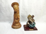 Lote de 2 enfeites, sendo Cristo em resina e Nossa Senhora em gesso. Medindo a maior 32cm de altura, com pequenos  bicados.