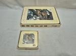 6 jogos americanos com 6 porta copos em madeira com imagens de safari. Medindo 25cm x 20cm.