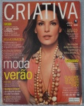Revista Criativa  Novembro de 2005 (Edição nº 199)  Capa Carolina FerrazEspecial Moda Verão: Guia completo de biquínis (como escolher o melhor modelo), estampas chiques para o calor e o revival dos anos 70 (saia cigana, look psicodélico e muitos colares).Qualidade de Vida: Matéria especial sobre como comer, malhar e cuidar da pele e dos cabelos aos 20, 30, 40 e 50 anos.