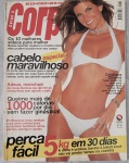 capa da revista Corpo a Corpo, edição nº 159, de março de 2002, estrelada pela atriz Cristiana Oliveira Na época, a atriz estava no ar na novela O Clone, e a edição trouxe reportagens focadas em estética, fitness e dietas práticas: