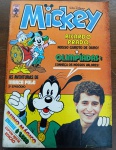 Revista Mickey Nº 382 - Ricardo Prado (Julho 1984)Relíquia absoluta para colecionadores de quadrinhos e entusiastas do esporte brasileiro! Esta edição icônica da Editora Abril foi lançada durante as Olimpíadas de Los Angeles (1984), apresentando o encontro de Mickey e Pateta com o nosso "Garoto de Ouro", Ricardo Prado.