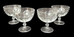 Jogo de quatro taças para sorvete em demi cristal translúcido. Mede 12cm altura.
