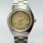 ORIENT - Relógio automático, não funciona. Pulseira: 13mm. Caixa: 3,2cm x 2,8cm, vertical x horizontal, sem contar a coroa. ***ATENÇÃO! ESTE RELÓGIO NÃO POSSUI GARANTIA DE FUNCIONAMENTO. Produto sendo vendido conforme ESTADO, testado, ou não, diz respeito apenas ao momento da catalogação. Recomenda-se revisão.*** Se necessário, solicitar mais fotos, vídeos ou perguntas para análise via e-mail reidaantiguidade@gmail.com, Obrigado pela visita!