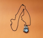 Belíssimo cordão em metal, com pingente em forma de coruja com relógio a quartz, esta sem bateria - Comprimento Total: 44 cm - Coruja relógio: 4 X 3 cm