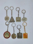 Lote com 8 chaveiros promocionais de diferentes empresas  - Metal  -  Medida do maior: 6,5 cm.