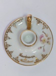 Lindo Castiçal Palmatória em Porcelana com detalhes a Ouro  -  Com dedicatória " lembranças de Laubari "   -  Medida:  8  cm de diâmetro.