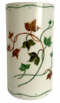 FRANÇA SÉC. XIX  - Vaso em densa opalina francesa branco leitoso, fartamente adornada à mão com ramalhetes de flores policromadas. Formato cilíndrico. Meados séc. XIX. Mede 20cm altura.