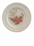 Prato Festival Stoneware  Gres, decorado à mão, com desenho floral em tons de vermelho queimado e folhagens douradas. Borda com leve relevo e filete em tom terroso. Peça decorativa e utilitária, ideal para composições rústicas e românticas de mesa. Mede 27 cm.
