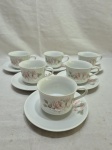 Jogo de 6 xícaras de chá em porcelana Schmidt floral. Medindo 8,5cm x 6,5cm de altura.