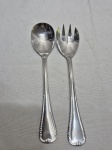 Par de talher de salada em aço inox Hercules. Medindo 19,5cm de comprimento.
