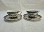 Par de xícaras de chá em porcelana oriental com dragão em relevo. Medindo 9cm x 6cm de altura.