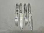 Jogo de 2 pares de talheres de churrasco em alumínio com lâmina em aço inox argentino. Medindo a faca 21,5cm de comprimento, garfo 18,5cm de comprimento.