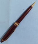 Caneta - Lapiseira ponta 0,5mm !! material com desenho estiloso !! cor grena !! funcionando perfeito !! acervo de colecionador !!