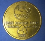 Medalha dos primeiros Jogos Masters de Natação de Torontoi/Canada !!! material bronze !! ano de 1985  !!