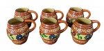 Seis canecas em cerâmica artesanal, estilo rústico com pintura manual em tons terrosos e decoração floral colorida em relevo. Medindo: 10 x 9 x 9 cm. base marcada Maritália Santarém"