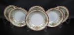 NORITAKE, Nippon Toki Kaisha - Seis pratos fundos em porcelana japonesa esmaltada nas cores branca e creme, decoração de ramos flores e volutas, bordas filetadas a ouro. Manufatura no verso. Medindo: 4 x 19 cm
