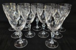 Onze taças para vinho tinto em cristal translucido com lapidação de estrelinhas.Marca ao fundo.  Medindo: 17,5 x 7,5 cm. 