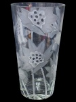 CRISTAL, um (1) vaso cilíndrico, confeccionado em cristal translucido, com lapidação de flores e folhagens em baixo relevo fosco, apresenta bicados na borda e batidas laterais, fundo estrelado, peça medindo 30x17cm.