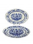 PORCELANA STEATITA, duas (2) travessas ovais, confeccionadas em porcelana nacional na tonalidade branca, decoração dita CEBOLINHA na tonalidade azul, medindo 40x26cm e 35,5x24cm.