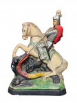 ARTE SACRA, um (1) imaginário confeccionado em estuque patinado representando São Jorge com pintura policromada, medindo 23cm de altura, leves falhas na patina.