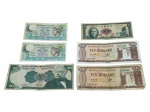NUMISMÁTICA, seis (6) cédulas estrangeiras, sendo: A) duas (2) cédulas da REPVBLICA ITALIANA, no valor de 500; B) uma (1) cédula chinesa; C) uma (1) cédula do BANCO CENTRAL DE VENEZUELA, no valor de 20 BOLÍVARES; D) duas (2) cédulas do BANK OF GUYANA, no valor de TEN DOLLARS cada. Apresentando sinais do tempo, vincos e desgastes.