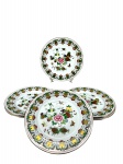 PORCELANA ORIENTAL, seis (6) pratos para sobremesa confeccionados em porcelana na tonalidade branca, decorada por flores, folhagens e frutos em rica policromia com filetes e realces em ouro, medindo 25,5cm de diâmetro.