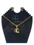 BIJUTERIAS, conjunto com três (3) peças, sendo: A) 1 colar c/ pingente, medindo 39cm de comprimento e pingente 2x2cm e B) 1 par de brincos para orelha furada, medindo 1,5x1,5cm, confeccionados em metal dourado, decorado por coração e lua em vazados com decoração prateada e incrustado por pedrarias sintéticas, sinais de uso.