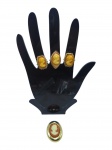 BIJUTERIAS, lote com quatro (4) peças confeccionadas em metal dourado, sendo 3 anéis e 1 porta guardanapo, decorados por placa sintética na tonalidade coral, com camafeu em relevo em cor clara, aros 17, apresentam falhas na douração, porta guardanapo medindo 4x3cm, falhas na douração.