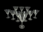 CRISTAIS, dez (10) taças para champanhe, confeccionadas em cristal translúcido, bojo cônico com lapidação dita DEDÃO, haste facetada, apoada sobre base circular, 7 apresentam pequenos bicados na borda, medindo 14,5x10cm.