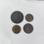 Quatro moedas brasileiras e estrangeiras a classificar