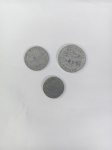 Três moedas estrangeiras diversas a classificar