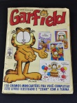 Álbum de figurinhas do Garfield faltando somente a figurinha de nº 66