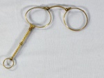 Antigo lorgnette, um tipo de óculos de cabo popular no século XIX