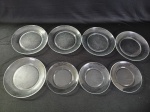 Conjunto com oito pratos rasos durarex transparentes.