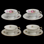 Conjunto com 4 xícaras com seus pires em porcelana KPM apresentando decoração floral. No fundo marca da manufatura. 4 x 8 cm (xícara) 12 cm (pires).