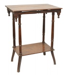 Mesa auxiliar para dois planos, formato retangular executada em madeira torneada. 78 x 61 x 39 cm.