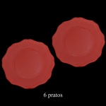 Conjunto com seis sousplat em cerâmica artesanal da manufatura nacional Luiz Salvador, Itaipava. Apresenta borda ondulada e cor vermelho intenso. 34 cm. Marca da manufatura no verso. Peças sem uso.