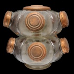 Antigo Baleiro duplo de formato circular em vidro translucido. Apresenta oito compartimentos com tampa em metal. 50 x 45 cm. Apresenta desgastes nas tampas.